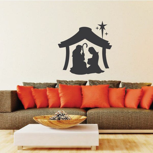 Image of Mary and Joseph in Manger Decal