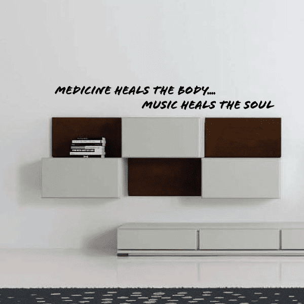 Inspirational wall decal with text: "Medicine heals the body... Music heals the soul"