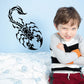 Black scorpion wall decal with menacing claws and tail