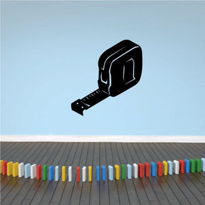 Black metal tape measure decal with extended tape and colored measurement blocks