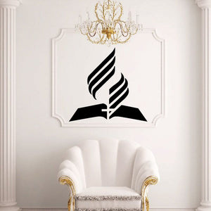 Black cross with bible decal design, centered on a light background.