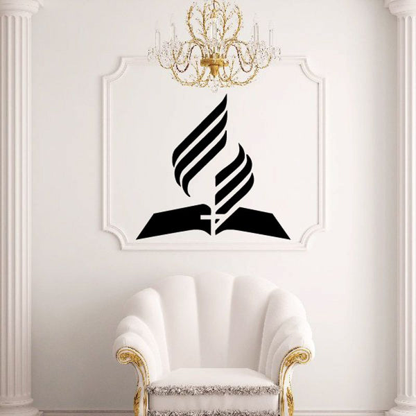 Black cross with bible decal design, centered on a light background.