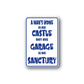 Rectangular vinyl decal with blue border and quote text: A MAN'S HOME IS HIS CASTLE