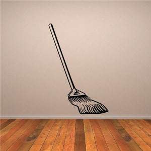 Black mop decal with angled handle and striped brush head