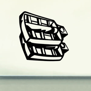 Motorcycle foot peg decal with bold black and white geometric design