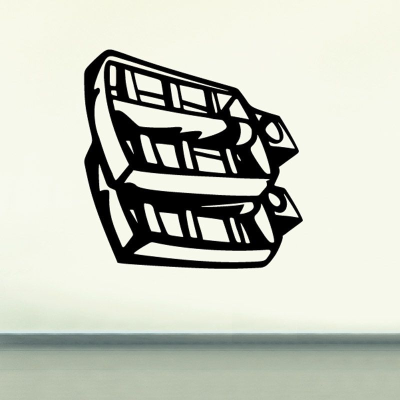 Motorcycle foot peg decal with bold black and white geometric design