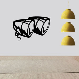 Motorcycle headlight decal, black vinyl with white outline, stylized dual headlights