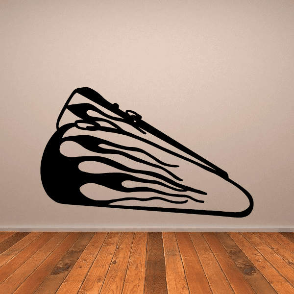 Motorcycle fuel tank with flame decal, black tank and beige flame design