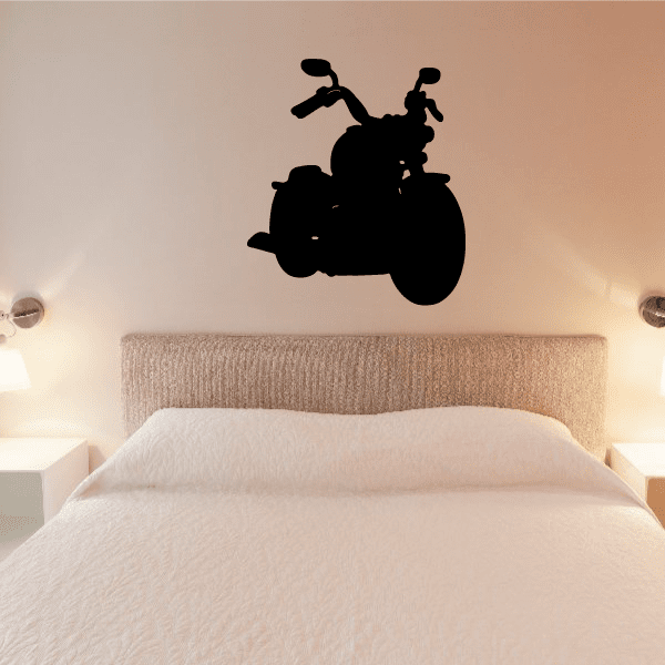 Motorcycle wall decal vinyl sticker with black rider and bike silhouette on a wall