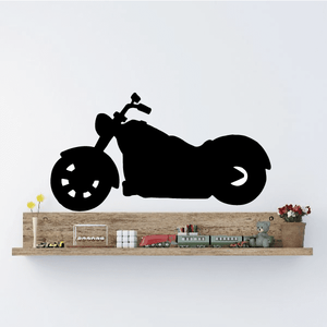 Motorcycle wall decal, black vinyl silhouette of a sport bike on a wall