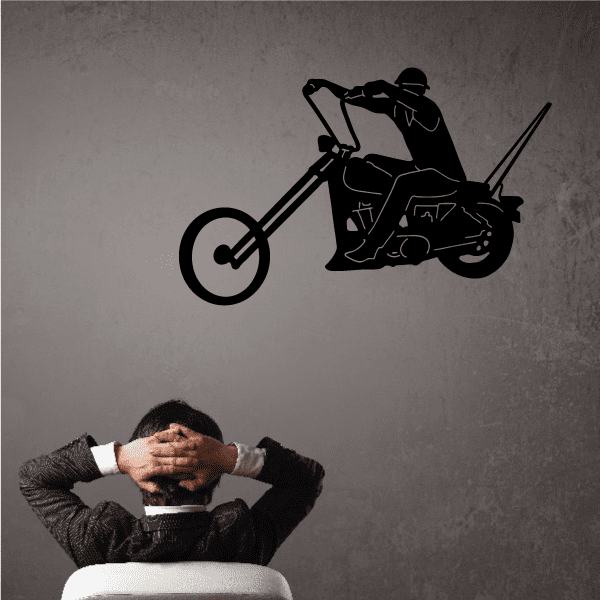 Motorcycle wall decal with black rider on sport bike and front wheel circle