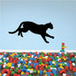 Black mountain lion landing decal, mid-leap pose