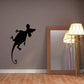 Black mouse silhouette wall decal with tail curling upward