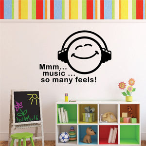 Music decal with smiling headphones and text “Mmm... music... so many feels!”