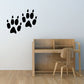 Dog paw track decal with four black paw prints and a trailing paw pattern