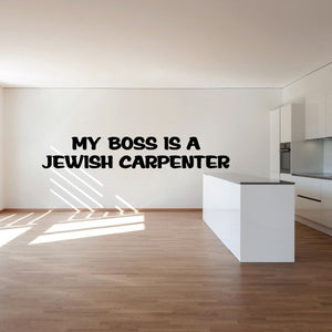Wall decal with bold text: 'MY BOSS IS A JEWISH CARPENTER'