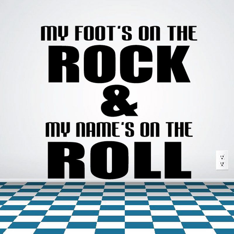 Wall decal with large black lettering: 'Foot's on the rock & name's on the roll'