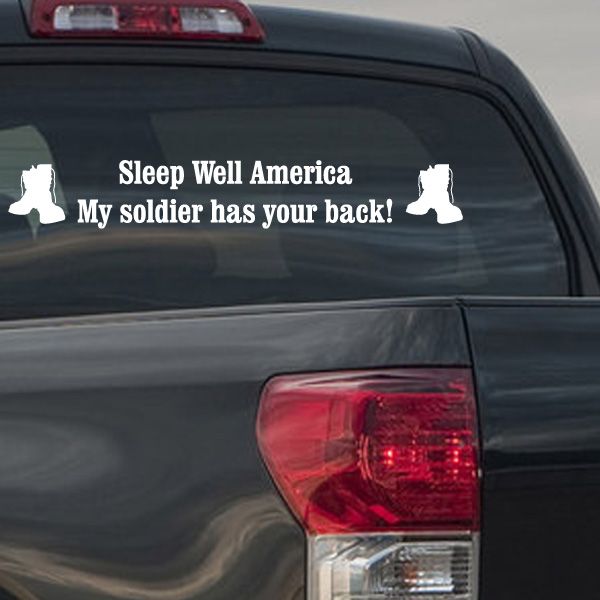 White motivational vehicle decal text with soldier silhouettes on dark rear window.
