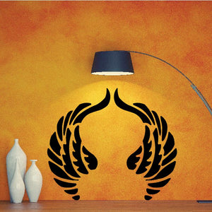Angel wings decal with black outline and stylized halo-like flames