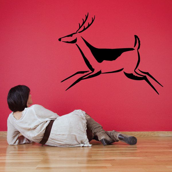 Black buck deer wall decal with extended antlers in side profile