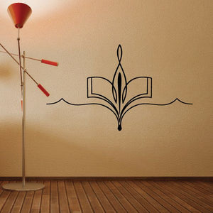 Southwestern wall decal vinyl with black stylized bird-feather cross and wave lines