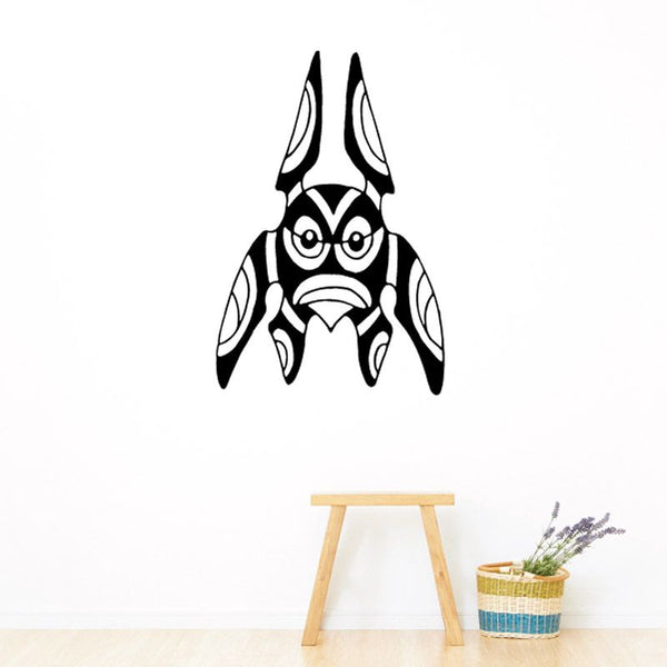 Black and white tribal mask decal with large round eyes and open mouth