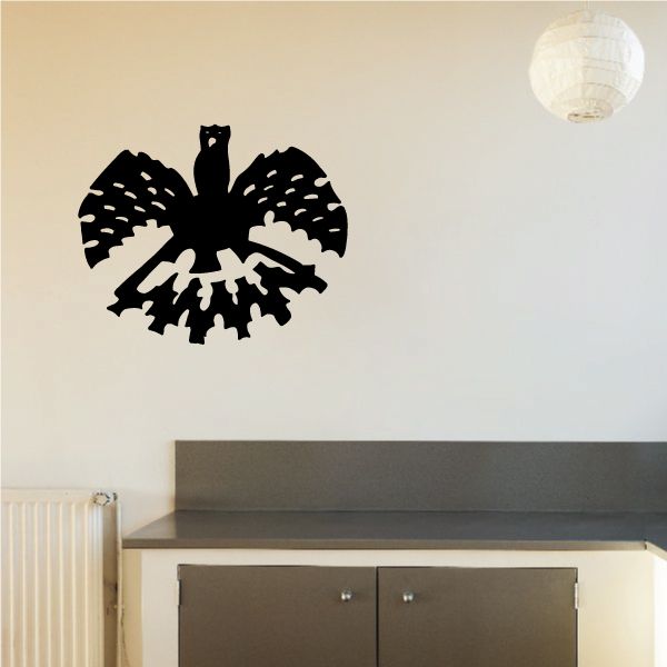 Black raven wall decal with spread wings and white feather dot accents