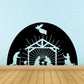 Nativity scene wall decal: black arch with white silhouette stable and figures.