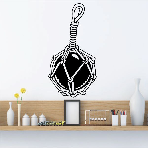 Vinyl wall decal of a decorative pendant with diamond center and hanging cord