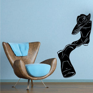 Black vinyl wall decal of cartoon boy pointing to the right, minimalist lines