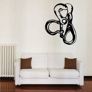 Black vinyl wall decal with a stylized animal face wearing headphones.