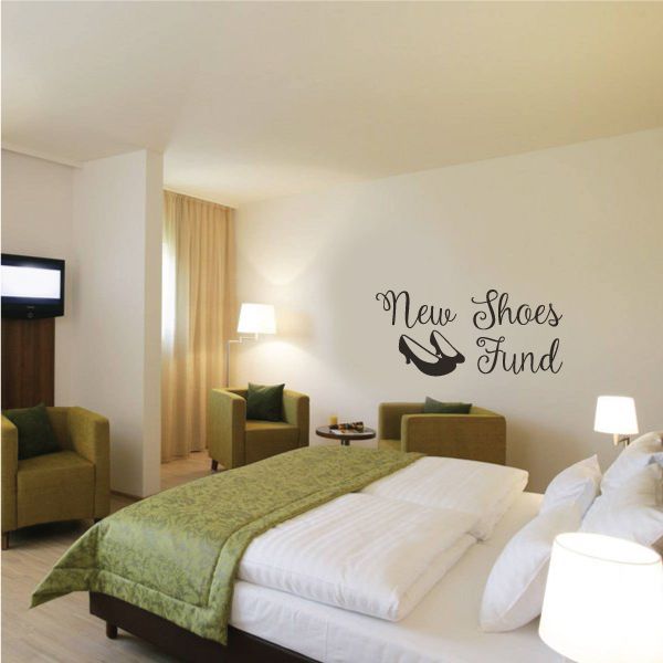 Wall decal with cursive “New Shoes Fund” and a black high-heel icon