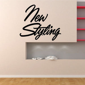 Black script vinyl wall decal reading 'New Styling'