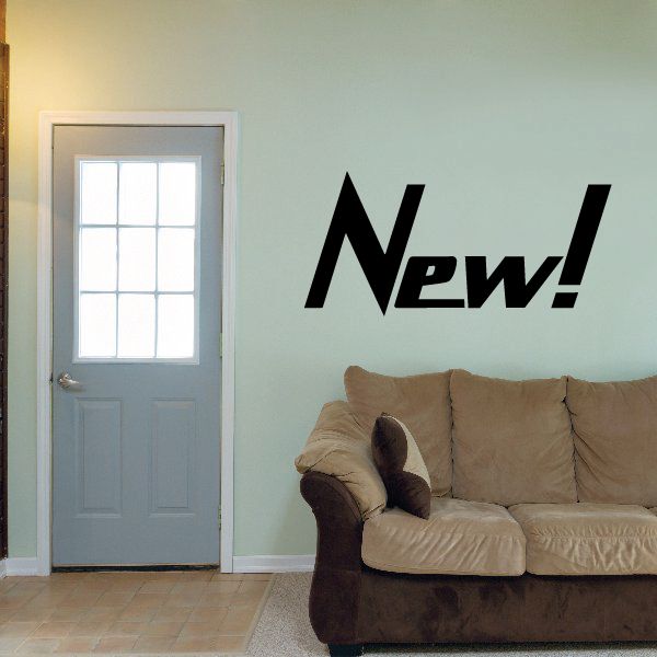Vinyl wall decal reading “New!” in black