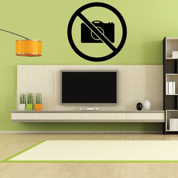 Vinyl wall decal featuring a black camera with a diagonal slash inside a circle