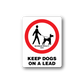 White vinyl sign decal with red circle, leash dog icon and 'KEEP DOGS ON A LEAD' text