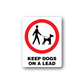 Dog leash sign wall decal with red circle, person and dog silhouettes, 'KEEP DOGS ON A LEAD'.