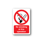 No smoking wall decal sticker: red circle slash, cigarette icon, 'No smoking at this operation'