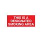 Red wall decal sign with white text: THIS IS A DESIGNATED SMOKING AREA