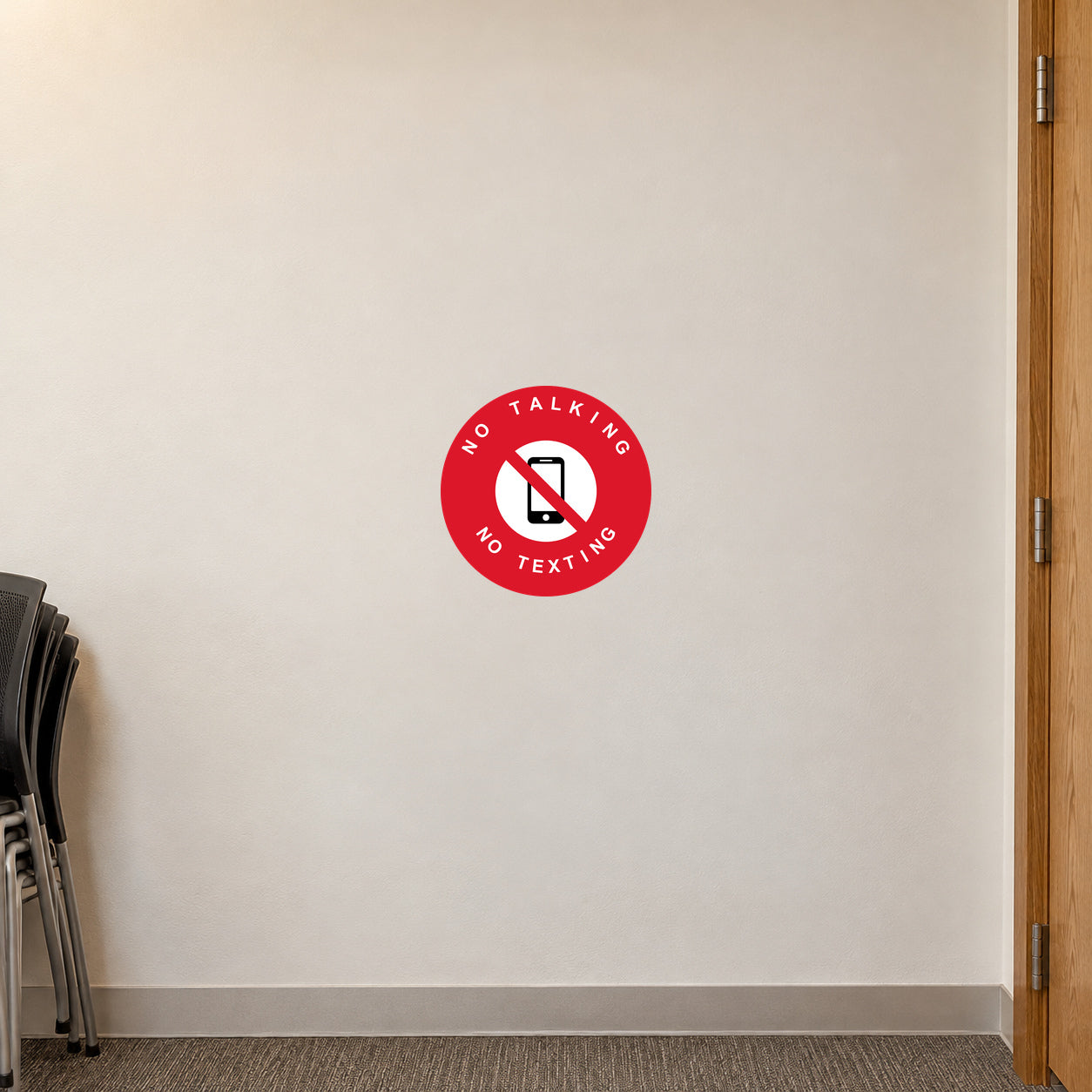 Round red no-phone sticker: crossed-out phone, 'No Talking, No Texting'.