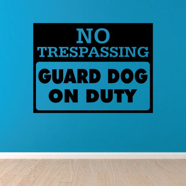 Wall decal with bold text: NO TRESPASSING, GUARD DOG, ON DUTY