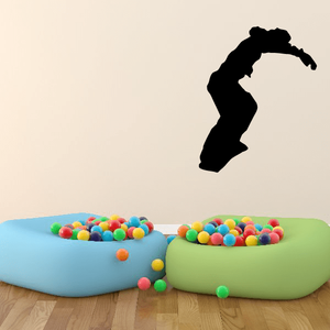 Black snowboarder silhouette decal on wall