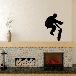 Black skateboarder silhouette decal with board, wall sticker