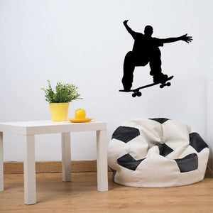 Skateboarding wall decal vinyl: black silhouette skater on skateboard