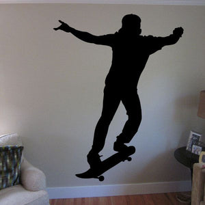 Black skateboarding trick decal, silhouette of rider doing a nose manual