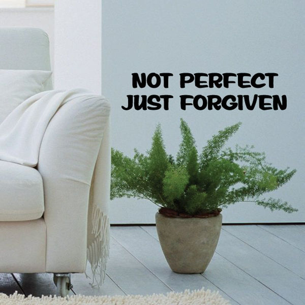 Wall decal with bold black text: NOT PERFECT JUST FORGIVEN