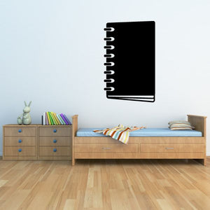 Black notebook decal with white spiral binding