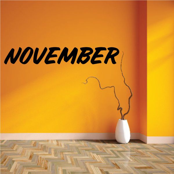 November wall decal vinyl: black 'NOVEMBER' text with outlined silhouette on wall