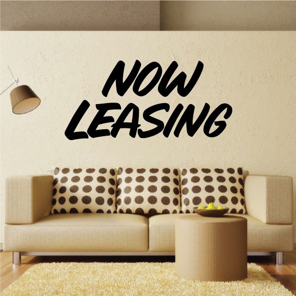 Now Leasing wall decal with bold black NOW LEASING lettering