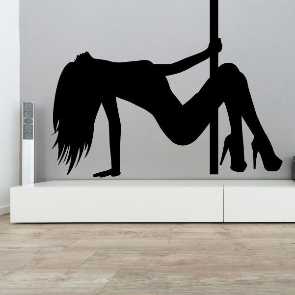 Pole dancer wall decal: black silhouette of performer leaning back on a pole in heels.